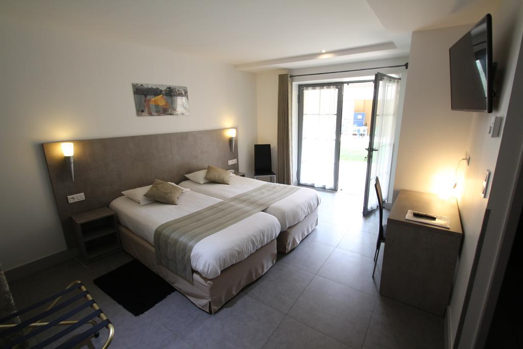 Logis Hotel Archambeau Thonac Exteriör bild